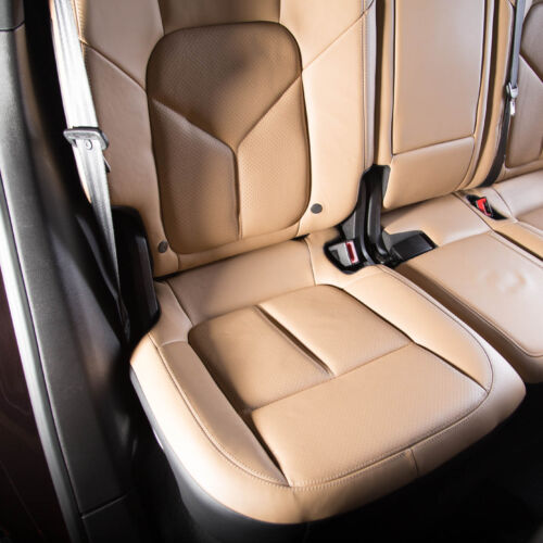 The beige interior decoration of a luxurious car